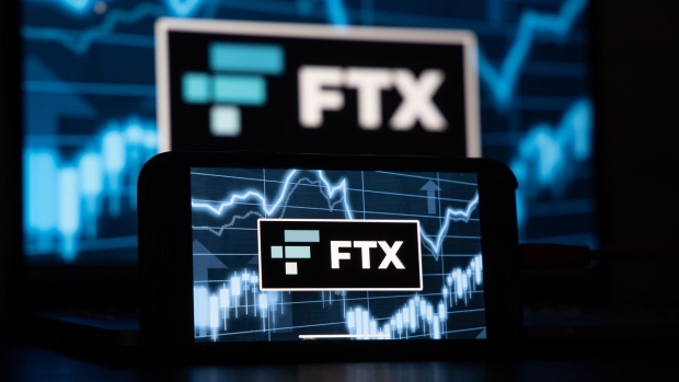 The FTX Cryptocurrency Derivatives Exchange logo on a digital device arranged in Riga, Latvia, Nov. 24, 2022. The implosion of Sam Bankman-Fried’s FTX empire dealt a harsh blow to the Bahamas’ ambitions to be a hub for the crypto industry, and it’s causing massive pain for locals who treated the now-bankrupt exchange like a bank. Photographer: Andrey Rudakov/Bloomberg