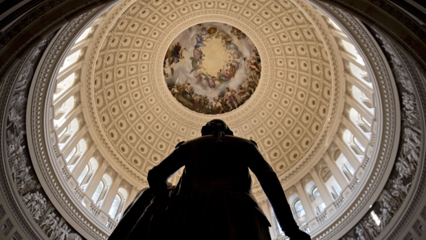 A statue of George Washington stands in the U.S. Capitol Rotunda in Washington, D.C., U.S., on Tuesday, Dec. 19, 2017.