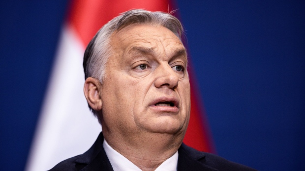 Viktor Orban, Hungary's prime minister, speaks during a news conference in Budapest, Hungary, on Tuesday, Dec. 21, 2021. Orban's government has objected to last year’s decision by the top EU court that his government can’t hold asylum seekers indefinitely in a transit area on the border with Serbia.