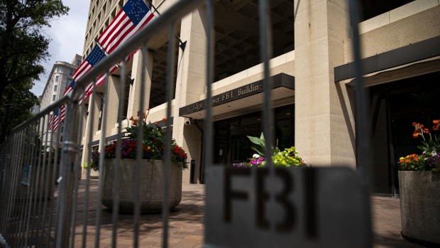 Security fencing outside the Federal Bureau of Investigation (FBI) headquarters in Washington, D.C., US, on Monday, Aug. 22, 2022. The FBI has come under intense political criticism for executing a search warrant on Donald Trump's Mar-a-Lago home in Florida and is confronting threats that don't appear to be subsiding, including an armed man who attacked the bureau's Cincinnati field office.