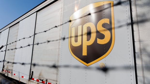 A delivery truck parked outside a UPS hub in the Brooklyn borough of New York, US, on Friday, April 21, 2023. Part-timers and weekend drivers are expected to be among the key points of debate as the Teamsters and United Parcel Service Inc. begin talks this week on the largest collective bargaining agreement in the US, reports the Wall Street Journal. Photographer: Paul Frangipane/Bloomberg
