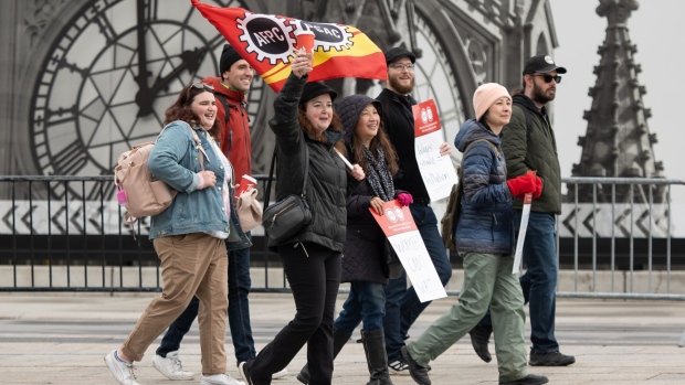 Demonstrators during a Public Service Alliance of Canada strike in Ottawa, Ontario, Canada, on Wednesday, April 19, 2023. More than 155,000 federal workers in Canada went on strike after wage talks with Prime Minister Justin Trudeau's government failed.