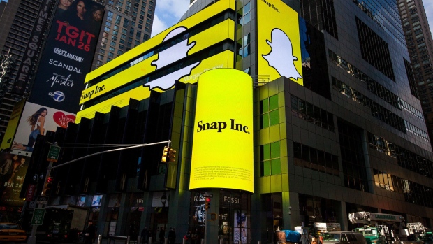 Snap Inc. signage is displayed on screens outside of the Morgan Stanley building in New York, U.S., on Thursday, Feb. 16, 2017. Snap Inc. is seeking to raise as much as $3.2 billion in its initial public offering in what could be the third-biggest technology listing of the past decade.