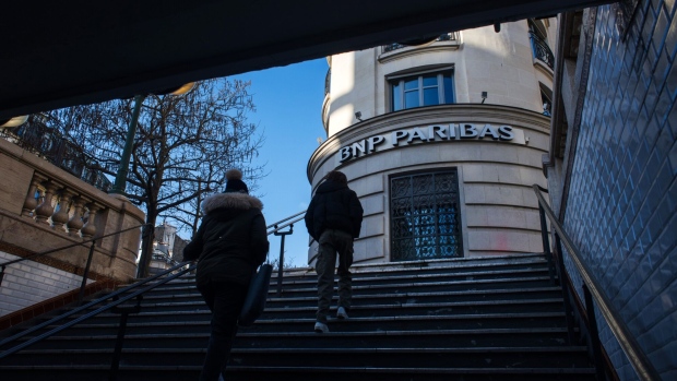 Pedestrians exit a metro station at the headquarters of BNP Paribas SA bank, in Paris, France, on Monday, Feb. 6, 2023. BNP Paribas kicks off earnings season for French banks, reporting quarterly numbers Tuesday before the market opens in Paris.
