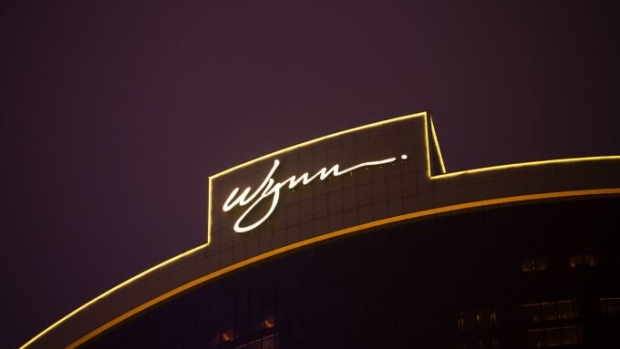 The logo for Wynn Macau casino resort, operated by Wynn Resorts Ltd., is displayed atop of the hotel in Macau, China, on Thursday, March 12, 2015.  Photographer: Billy H.C. Kwok/Bloomberg