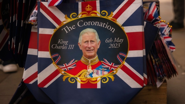 Royal and coronation related merchandise on sale at a street stall in Picadilly Circus in London, UK, on Sunday, April 30, 2023. The coronation is a religious event which celebrates the start of King Charles III’s reign.