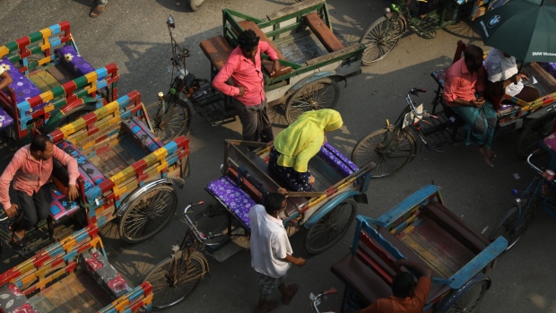 Commuters at Dhaka Export Processing Zones (EPZ), in Dhaka, Bangladesh, on Monday, April 17, 2023. The garment industry contributes about 10% to Bangladesh’s GDP and employs more than 4 million people. Photographer: Anik Rahman/Bloomberg