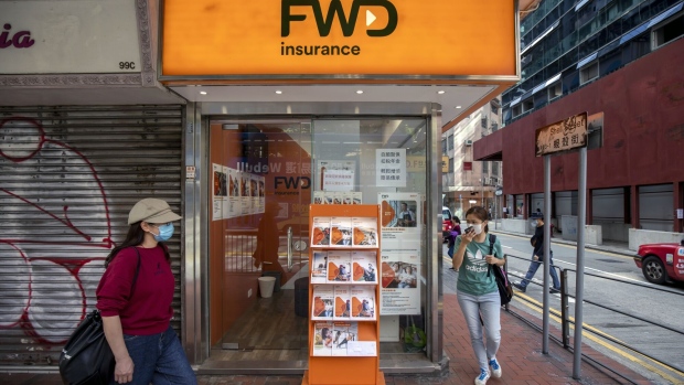 An FWD Group Holdings Ltd. store in Hong Kong, China, on Tuesday, March 1, 2022. FWD Group, the Asian insurer backed by Hong Kong billionaire Richard Li, filed an application for an initial public offering in the city, after U.S.-China tensions scuppered more ambitious plans for an overseas debut.