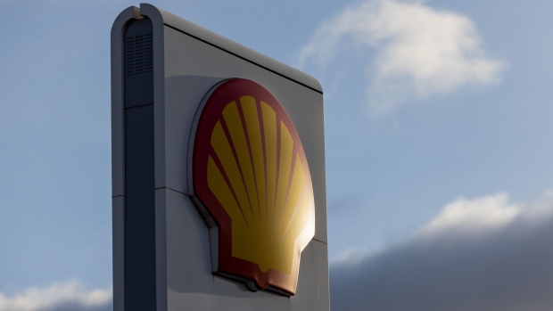 The Shell Plc company logo on a totem sign at the entrance to a petrol station in Romford, UK, on Thursday, Feb. 2, 2023. Shell posted a fourth-quarter profit that was well ahead of expectations as its natural gas business thrived, lifting the oil major to a record performance in 2022 fueled by soaring energy prices.