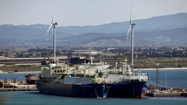 The Maran Gas Kalymnos liquefied natural gas (LNG) vessel, left, docked next to the Golar Tundra floating storage liquefied natural gas (LNG) regasification terminal vessel in the port of Piombino, Italy, on Friday, May 5, 2023. The gap between summer and winter prices of natural gas in Europe is widening, a sign of the persistent market fragility that could result in another crunch later this year. Photographer: Alessia Pierdomenico/Bloomberg