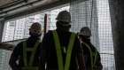 Safety officers at an Ayala Land Inc. site in Manila. Photographer: Veejay Villafranca/Bloomberg