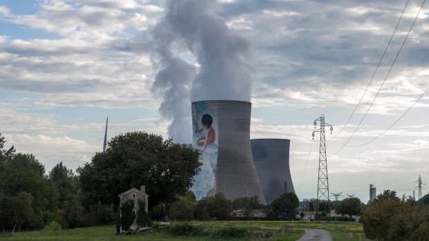 Vapor rises from cooling tower in the Cruas Nuclear Power Plant, operated by Electricite de France SA (EDF), in Cruas, France, on Saturday, Sept. 24, 2022. France President Emmanuel Macron has been making the case for energy savings and more investment in clean power and new nuclear plants to curb fossil fuel use and fight climate change.