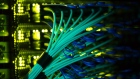 Cables run into terminal ports on the Sberbank and SberCloud Christofari supercomputer during an event to mark its launch into commercial operation inside the Sberbank PJSC data processing center (DPC) at the Skolkovo Innovation Center in Moscow, Russia, on Monday, Dec. 16, 2019. As Sberbank expands its technology offerings, the Kremlin is backing legislation aimed at keeping the country's largest internet companies under local control by limiting foreign ownership.