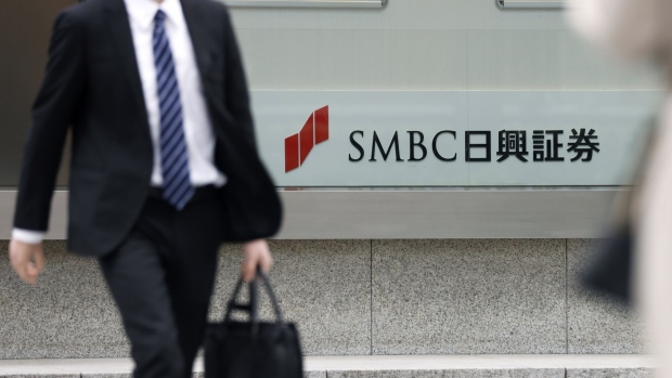 The logo of SMBC Nikko Securities Inc., a unit of Sumitomo Mitsui Financial Group Inc. (SMFG), outside its head office in Tokyo, Japan, on Monday, April 24, 2023. Financial services companies in Japan will report its fourth quarter earnings figures this week. Photographer: Kiyoshi Ota/Bloomberg