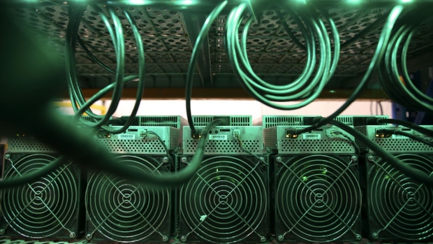 Cryptocurrency mining machines at a Canada Computational Unlimited Inc. computation center in Joliette, Quebec, Canada, on Friday, Sept. 10, 2021. CCU.ai, a Bitcoin mining center powered by hydroelectricity, has been conditionally approved for trading on the TSX Venture Exchange in Toronto under the stock symbol SATO.