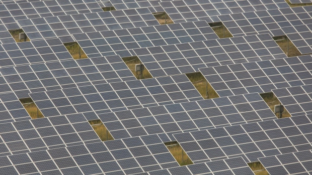 Photovoltaic panels at a solar farm operated by Yellow River Power in Gonghe County, Qinghai province, China, on Monday, Sept. 27, 2021. China, the world's biggest greenhouse gas emitter, can’t meet its environmental goals without connecting its abundant sources of renewable energy with its coastal megacities. Photographer: Qilai Shen/Bloomberg