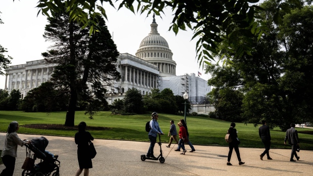 Visitors outside the US Capitol building in Washington, DC, US, on Tuesday, May 23, 2023. Debt-limit negotiators will meet this morning in Washington as President Joe Biden and House Speaker Kevin McCarthy remained without an agreement to avert a catastrophic US default with time running short.