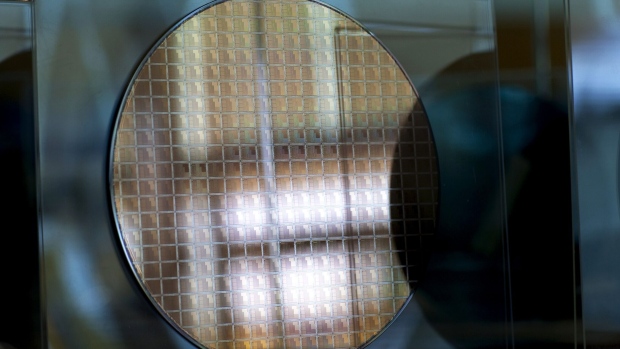 A silicon wafer at the Marvell Technology Group headquarters in Santa Clara, California. Photographer: David Paul Morris/Bloomberg