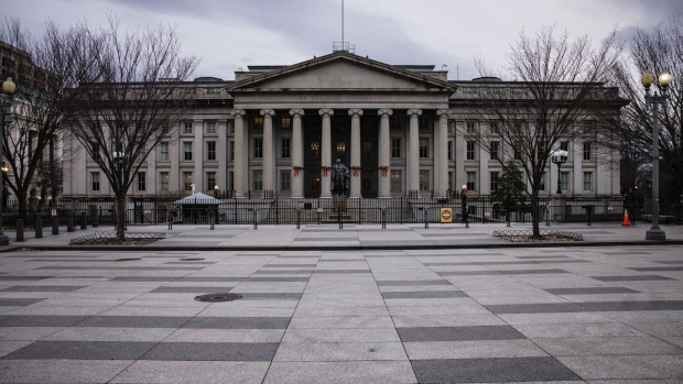 The U.S. Treasury building in Washington, D.C., U.S., on Sunday, Dec. 19, 2021. The Treasury's top official for financial oversight said government regulators need action from lawmakers to adequately protect investors, and the wider financial system, from risks posed by stablecoins. Photographer: Samuel Corum/Bloomberg