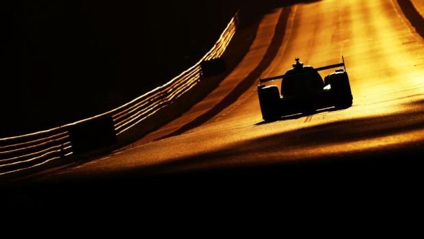 LE MANS, FRANCE - JUNE 11: Car heads towards Indianapolis corner at sunset during the 24 Hours of Le Mans at the Circuit de la Sarthe on June 11, 2022 in Le Mans, France. (Photo by Ker Robertson/Getty Images) Photographer: Ker Robertson/Getty Images Europe