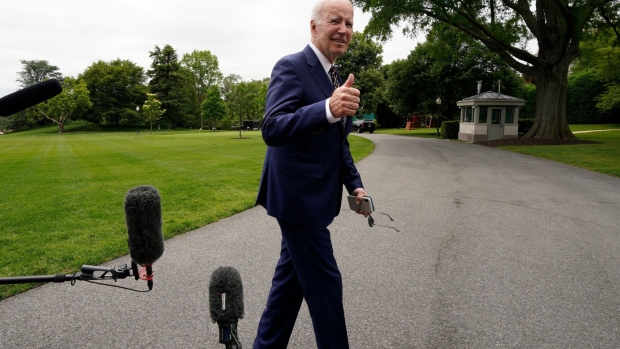US President Joe Biden gives a thumbs up on the South Lawn of the White House after arriving on Marine One in Washington, DC, US, on Sunday, May 28, 2023. Biden said that he was confident that legislation based on the tentative deal that he reached with House Speaker Kevin McCarthy on Saturday to avert a historic US default will reach his desk. Photographer: Yuri Gripas/Abaca/Bloomberg
