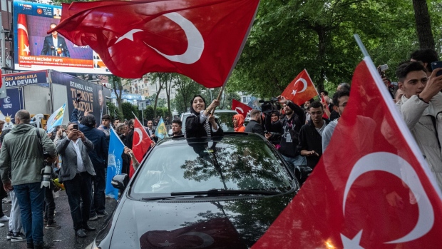 Erdogan supporters celebrate in front of the AK Party headquarters in Istanbul, on Sunday, May 28.