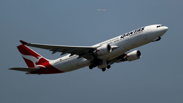 An Airbus SE A330 aircraft operated by Qantas Airways Ltd. takes off from Sydney Airport in Sydney, Australia, on Monday, Feb. 20, 2023. Qantas is scheduled to release earnings results on Feb. 23. Photographer: Brendon Thorne/Bloomberg