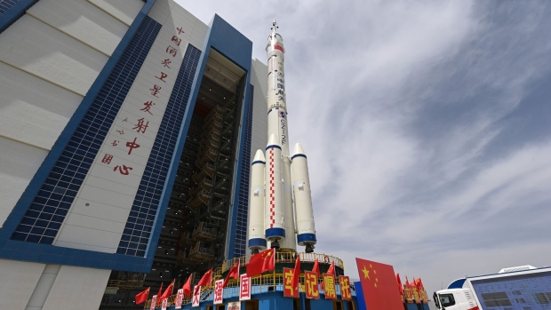 The Shenzhou-16 crewed spaceship and a Long March-2F carrier rocket being transferred to the launching area at the Jiuquan Satellite Launch Center on May 22. Photographer: Wang Jiangbo/Xinhua/Getty Images