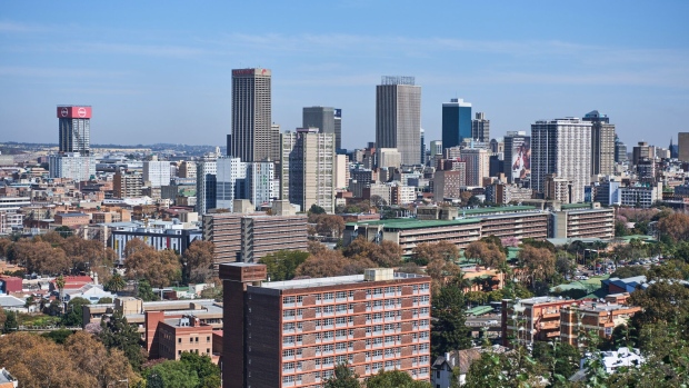 Commercial office buildings, including the Transnet SOC Ltd. headquarters office, center, in the central business district, viewed from the Yeoville district of Johannesburg, South Africa, on Thursday, May 25, 2023. South Africa is poised to lift interest rates for a 10th straight meeting to alleviate pressure on the rand fueled by government policy missteps that may lead the central bank to revise its inflation forecasts higher. Photographer: Waldo Swiegers/Bloomberg