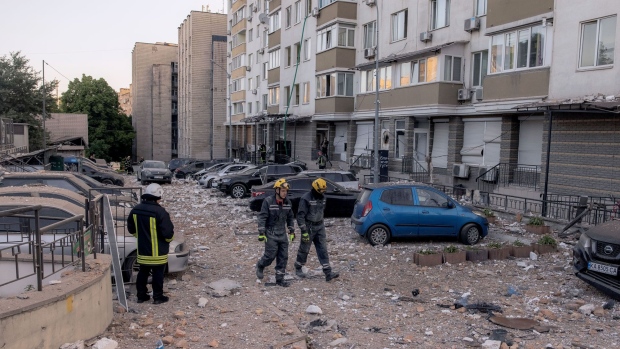 Emergency services at a site of a Russia drone attack in Kyiv, on May 30. Photographer: Roman Pilipey/Getty Images