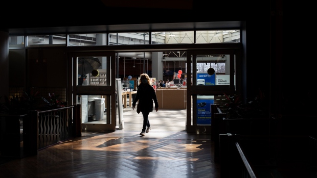 A shopper walks out of a Best Buy store at the Southland Center shopping mall in Taylor, Michigan, U.S., on Thursday March 3, 2022. The consumers who drive the global economy have remained surprisingly resilient as the Covid-19 pandemic pushed inflation to 40-year highs, made certain goods scarce and upended the job market.