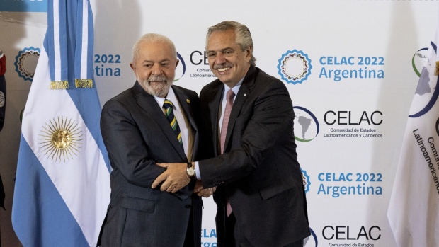 Argentina’s Alberto Fernandez welcomes Brazil’s Luiz Inacio Lula da Silva, left, during the Celac Summit in Buenos Aires on Jan. 24.