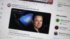 CHICAGO, ILLINOIS - APRIL 25: In this photo illustration, news about Elon Musk's bid to takeover Twitter is tweeted on April 25, 2022 in Chicago, Illinois. It was announced today that Twitter has accepted a $44 billion bid from Musk to acquire the company. (Photo Illustration by Scott Olson/Getty Images)