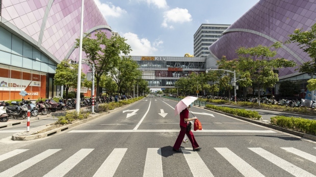 The Dalian Wanda Group Co. Qingpu shopping mall in Shanghai, China, on Thursday, May 25, 2023. Wanda said online rumors that it's selling 20 shopping malls for 16 billion yuan ($2.3 billion) is "untrue", according to a statement on its website. Photographer: Qilai Shen/Bloomberg