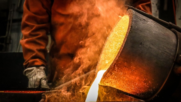 A worker pours gold from a crucible into a mold at the ABC Refinery smelter in Sydney, New South Wales, Australia, on Thursday, July 2, 2020. Western investors piling into gold in the pandemic are more than making up for a collapse in demand for physical metal from traditional retail buyers in China and India, helping push prices to an eight-year high. Photographer: David Gray/Bloomberg