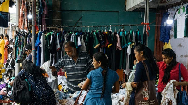 Customers browse clothes in Jaffna, Sri Lanka, on Monday, Oct. 24, 2022. Sri Lanka’s 70% inflation is hitting its peak as crippling shortages ease and bailout funds look within reach, yet it’s far from putting the central bank governor at ease.