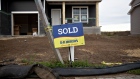 A "Sold" sign stands outside a home under construction at the D.R. Horton Inc. Eastridge Woods development in Cottage Grove, Minnesota, U.S., on Friday, Oct. 19, 2018. D.R. Horton Inc. is scheduled to release earning figures on November 7th.