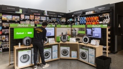 An employee cleans an iRobot Corp. Roomba display inside an Amazon.com Inc. 4-star store in Berkeley, California, U.S., on Friday, March 29, 2019. Amazon's new franchise of retail stores, called Amazon 4-star, stock a potpourri of items with positive reviews on the company's online retail site.