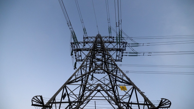An electricity pylon in Corby, UK, on Wednesday, Dec. 14, 2022. UK power prices for Monday jumped to record levels as freezing temperatures are set to cause a surge in demand, just as a drop in wind generation causes a supply crunch.