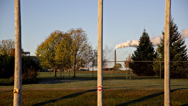 Steam rises from a stack on the grounds of the 3M Co. Cottage Grove Center in Cottage Grove, Minnesota, U.S., on Thursday, Oct. 18, 2018. 3M's Cottage Grove factory had been churning out some varieties of Per-and polyfluoroalkyl substances (PFAS) since the 1950s for the water- and stain-repellant Scotchgard. Recent studies have linked widely used PFAS to reduced immune response and cancer. As awareness spreads, 3M has been named in dozens of lawsuits, several this year alone. The company said the chemicals aren't a danger to public health.