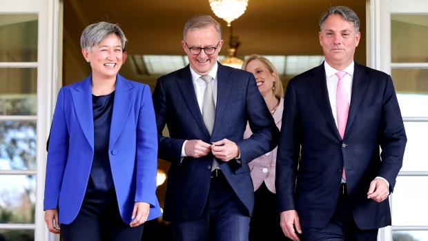 Anthony Albanese, Australia's prime minister and leader of the Labor Party, center, Penny Wong, foreign affairs minister, left, and Richard Marles, deputy prime minister, leave the Government House after being sworn in at a ceremony in Canberra, Australia, on Monday, May 23, 2022. Anthony Albanese has been sworn in as Australia’s 31st prime minister in a short ceremony in Canberra on Monday, taking office with a promise of swift action on climate change, greater gender equality and improved wage growth. Photographer: Brendon Thorne/Bloomberg