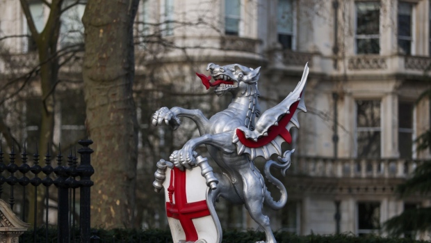 Detail of a City Dragon statue, an emblem used to mark the entrances and exits of the square-mile financial district of the City of London, UK, on Wednesday, March 23, 2022. The UK Government wants to supercharge the City of London's growth, arguing it will boost the whole country’s post-Brexit prospects. Photographer: Hollie Adams/Bloomberg