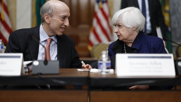 Janet Yellen, US Treasury secretary, speaks with Gary Gensler, chairman of the US Securities and Exchange Commission (SEC), during a Financial Stability Oversight Council (FSOC) meeting at the Treasury Department in Washington, DC, US, on Friday, Dec. 16, 2022. US stocks continued to drop today as latest data indicated that the Federal Reserve's aggressive tightening is hitting the economy, with investors concerned that the central bank's resolve to keep raising rates could tip the economy into a recession.