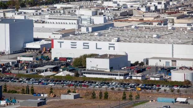 The Tesla Inc. assembly plant stands in this aerial photograph taken above Fremont, California, U.S., on Wednesday, Oct. 23, 2019. Tesla shares are trading above Wall Street expectations after spending most of the year languishing below analysts' average price targets.