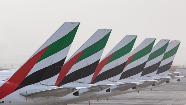 Emirates Airline Boeing 777 passenger jets. Photographer: Christopher Pike/Bloomberg