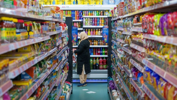 A shopper browses groceries at a supermarket in Sheffield, UK. Photographer: Dominic Lipinski/Bloomberg