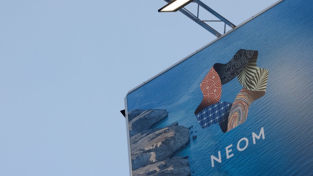A sign outside the NEOM pop-up store on the closing day of the World Economic Forum (WEF) in Davos, Switzerland, on Friday, Jan. 20, 2023. The annual Davos gathering of political leaders, top executives and celebrities runs from January 16 to 20. Photographer: Stefan Wermuth/Bloomberg