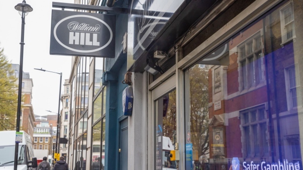 A William Hill betting shop in London, UK, on Wednesday, March 29, 2023. 888 Holdings Plc’s William Hill, the UK’s second-biggest bookmaker, will pay a settlement of £19.2 million ($23.6 million) for social responsibility and money laundering failures, amid a push to clean up the country’s gambling industry.