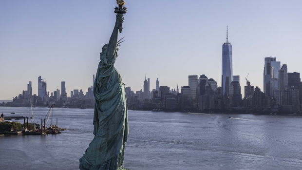 The Statue of Liberty in New York, U.S., on Thursday June 17, 2021. New York state's pandemic mandates were lifted last week, after 70% of the adult population has now been given at least one dose of a coronavirus vaccine.