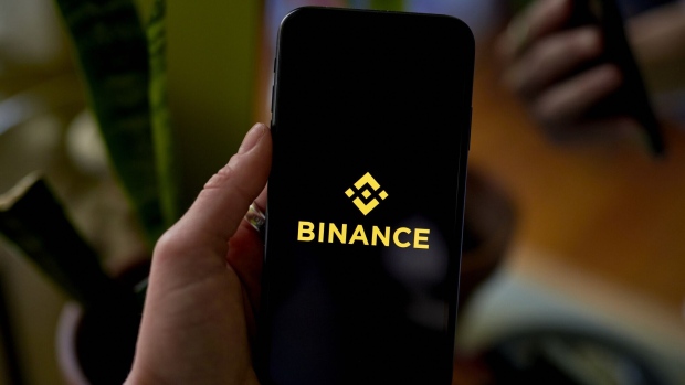 The Binance logo on a smartphone arranged in the Brooklyn borough of New York, US, on Tuesday, Feb. 14, 2023. The New York State Department of Financial Services said it had directed Paxos Trust Co. to stop issuing new tokens of crypto's third largest stablecoin, a Binance-branded coin known as BUSD that has roughly $16 billion in circulation. Photographer: Gabby Jones/Bloomberg